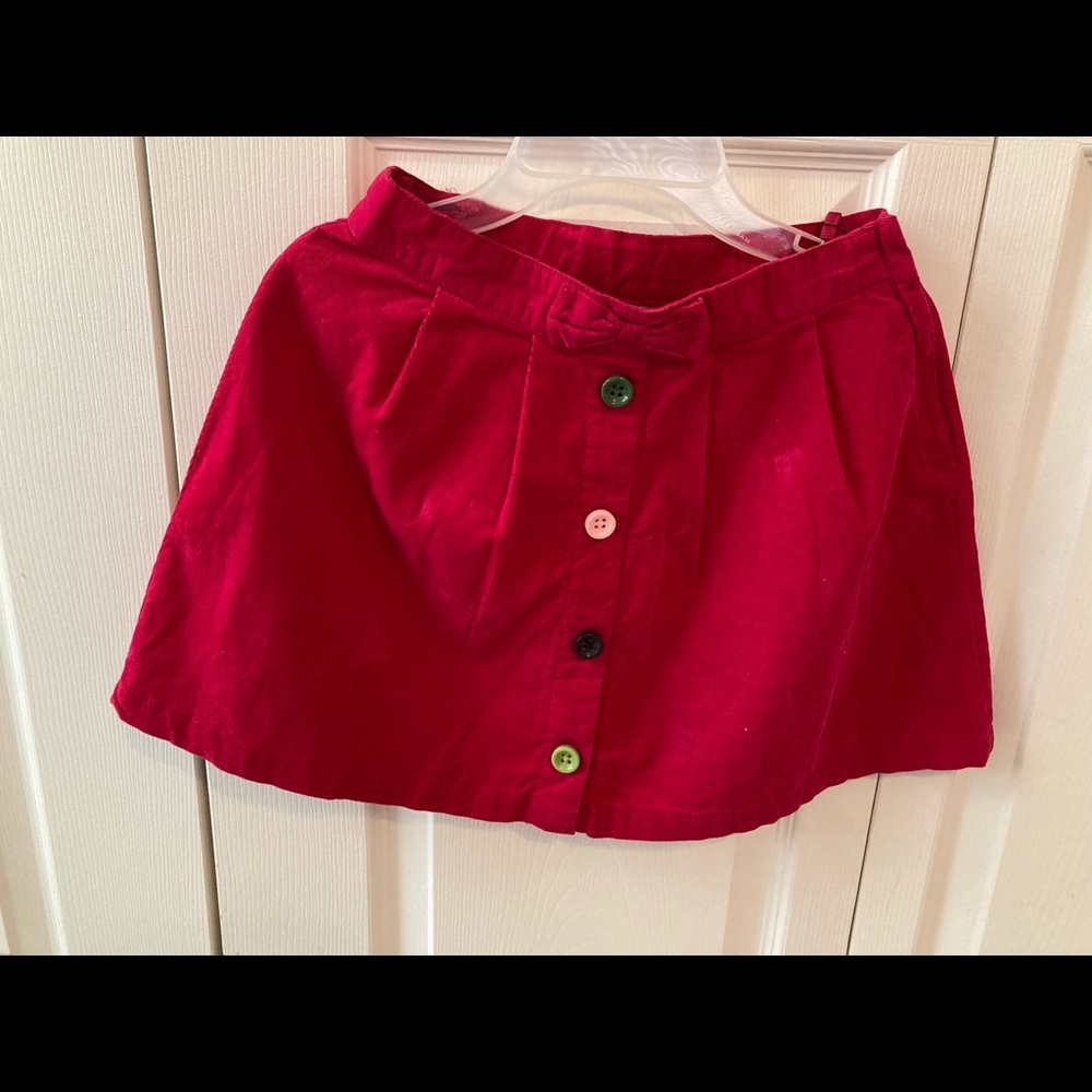 Brand New, red color, corduroy, soft material, front multicolor buttons skirt